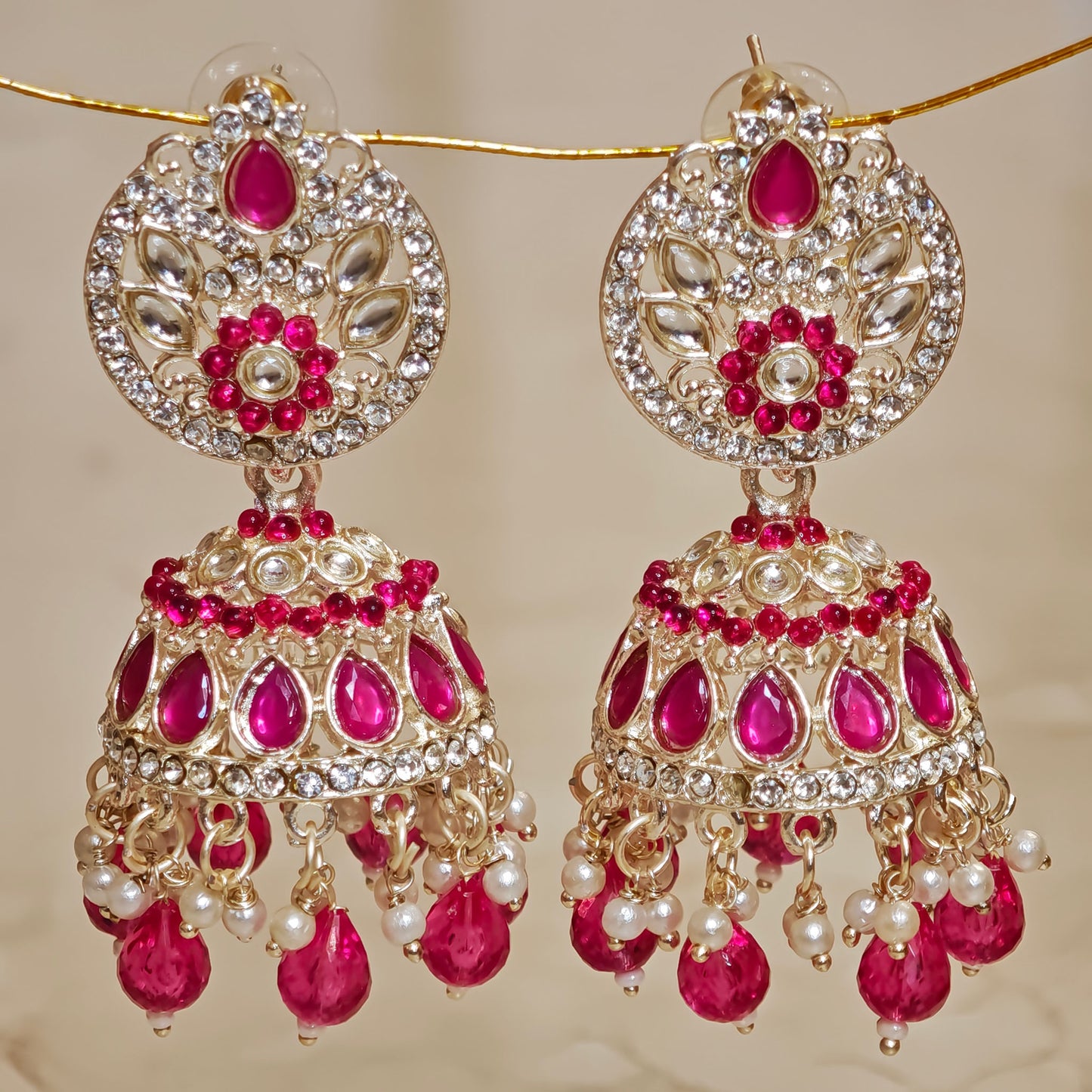 Rani Pink Silver Kundan Styled Stone Jhumki
