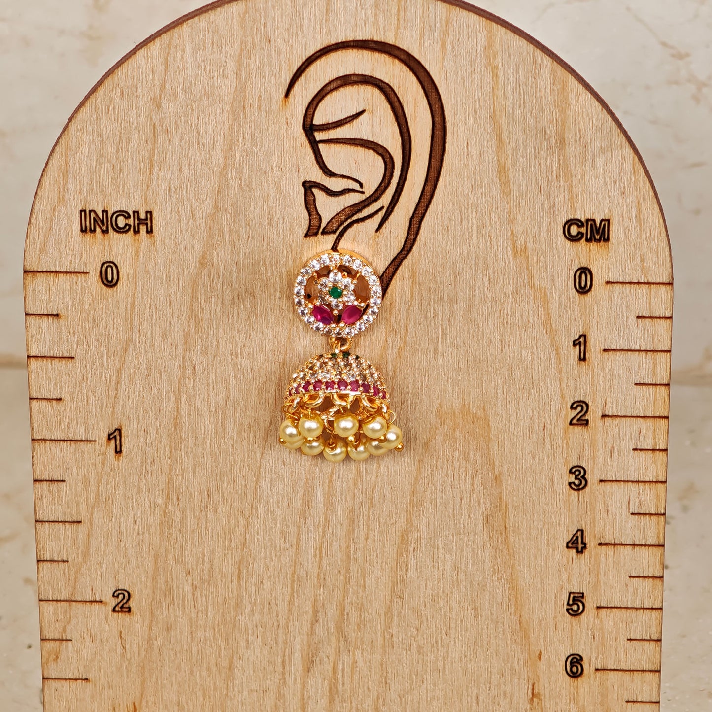 AD Floral Pearl Golden Jhumki