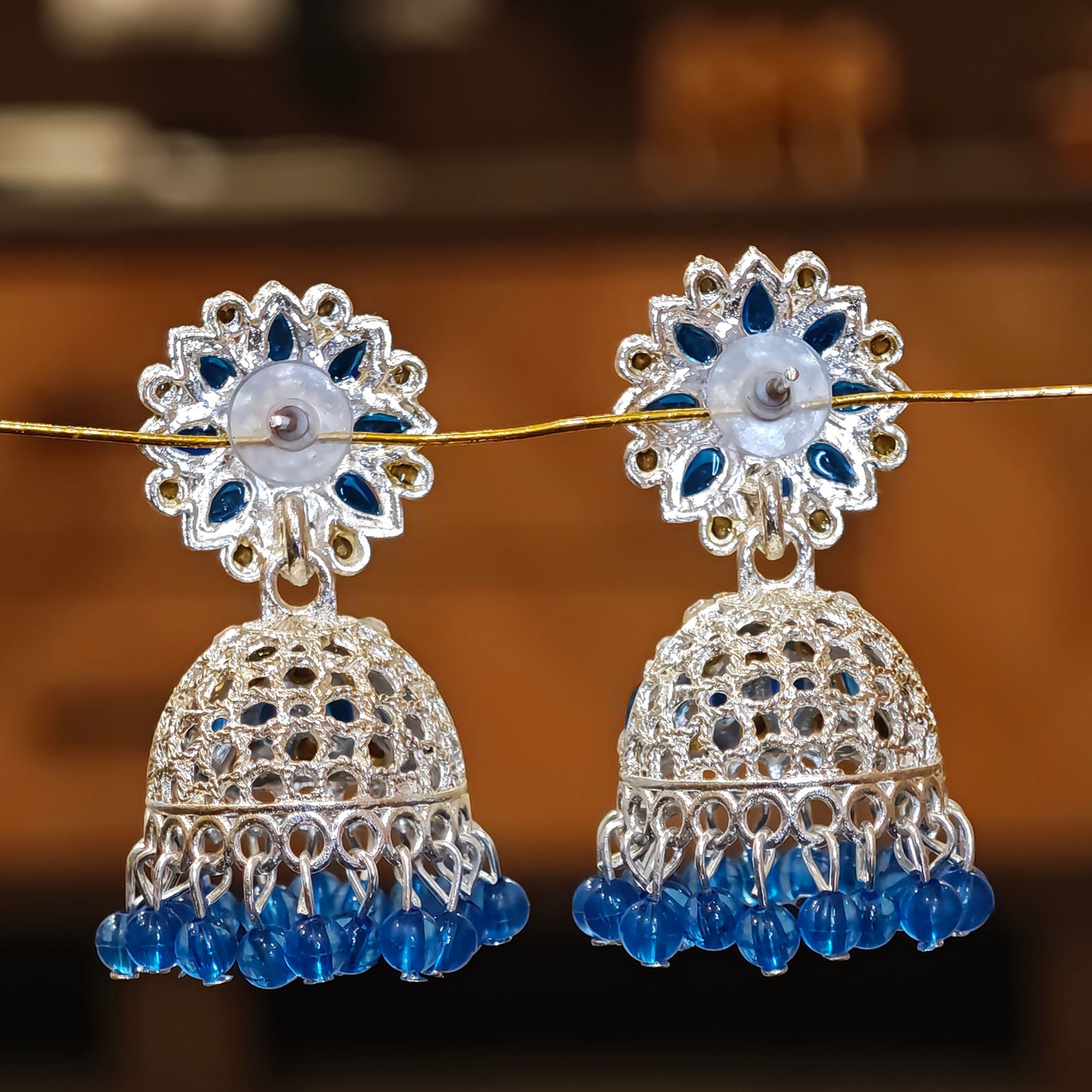 Blue Silver Toned Floral Jhumki