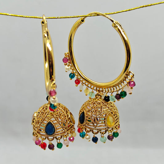 Gold hoop earrings with colorful beads on a Grey background 